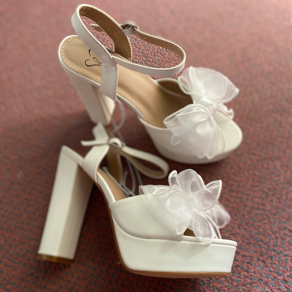 White satin bow platform heels